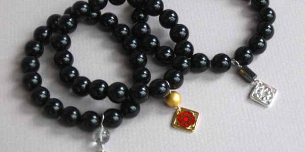 Pictures of my 10mm-19 Black Tourmaline beads bracelet prayer beads & Introduction to Meaning and Uses of Black Tourmaline